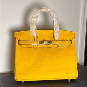 Yellow genuine leather Handbag